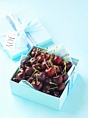 Fresh cherries in a box