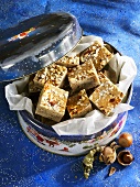 Gingerbread with chopped hazelnuts in biscuit tin