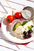 Vegetables and feta on skewers