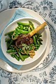 Lamb shank with vegetables and anchovies