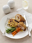 Stuffed chicken breast with rösti and vegetables