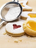 Jam biscuits dusted with icing sugar