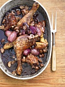 Chicken in red wine with shallots and button mushrooms