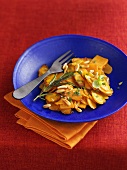 Pan-cooked pumpkin and carrots with herbs and pine nuts