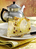 A piece of vanilla apple cake with raisins
