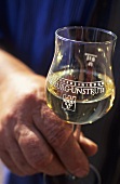 Winemaker with glass of white wine, Winzervereinigung Freyburg-Unstrut, Saale-Unstrut