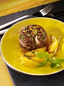 A lamb medallion with oranges and basil
