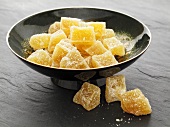 Pile of Candied Ginger on White Background