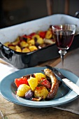Oven-baked sausage and potatoes
