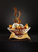 Caramelised kaki with honey, limes and vanilla ice cream