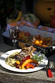 Roasted lamp chops with a pumpkin medley and couscous