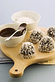 Snowballs (chocolate balls topped with grated coconut)