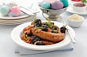 Sausages with prunes and onions