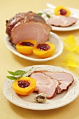 Smoked ham and peaches stuffed with cranberries for Easter