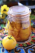 Bottled yellow tomatoes with Indian spices
