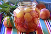 Peach and apricot compote in screw-top jar
