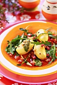 Warm potato salad with rocket