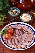 Ham platter with pickled vegetables and horseradish dip