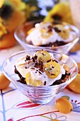 Chocolate dessert with kumquats and cream