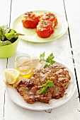 Barbecued pork neck steaks with honey marinade