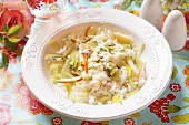 Rice salad with apple and kiwi fruit