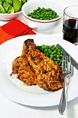 Pork chop with chilli and peas