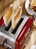 Slices of toast popping out of toaster
