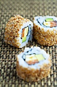 Inside-out rolls with salmon and avocado