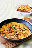 Frittata with meatballs and beans