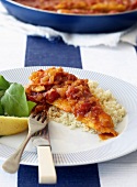 Fish fillet with Moroccan sauce on couscous