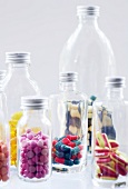 Assorted capsules and tablets in bottles