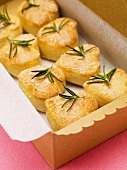 Heart-shaped savoury pastries with rosemary to give as a gift