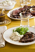 Roast beef with mushrooms and mashed potato
