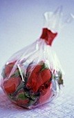 Roses in a plastic bag