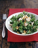 Parsley salad with chicken pieces and flaked almonds
