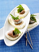Mozzarella slices with anchovy fillets