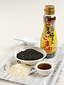 Black and white sesame seeds on Chinese newspaper