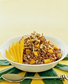 Red rice pudding with mango