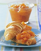 Apricot jam with white wine on a croissant