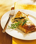 Puff pastry filled with fish and parsley
