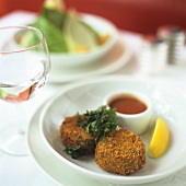 Cod cakes with tomato dip