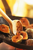 Caramelizing figs in a frying pan
