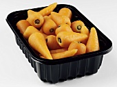 Paper carrots in plastic container