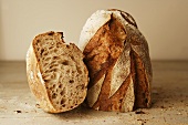 Farm bread, partly sliced