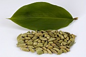 Green cardamom pods and leaf