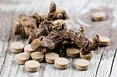 Dried galanga root and tablets