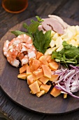 Fruit, shrimps and duck breast (ingredients for exotic salad)