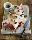 Leg of lamb studded with garlic and rosemary