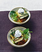 Courgette & sheep's cheese parcels with mint yoghurt on lentils
