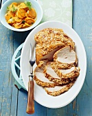 Roast turkey with spicy sesame crust and carrots